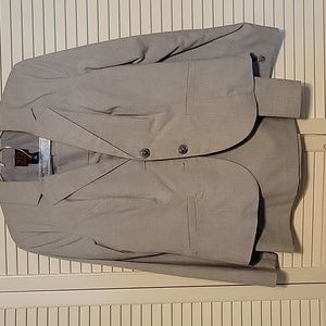 Light grey suit with lined jacket and straight skirt, size 12.